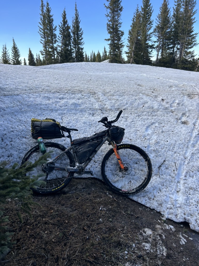 Bikepacking bike on a snowy trail.